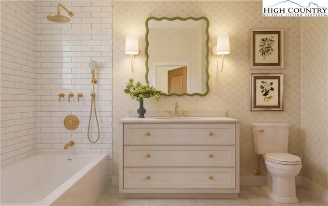 a bathroom with a sink a toilet and bathtub
