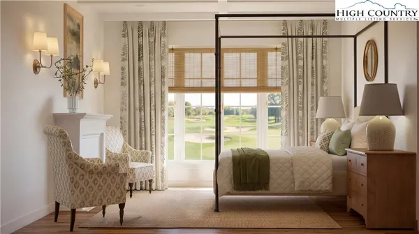 a bedroom with furniture and a window