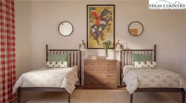 a bedroom with a bed and cabinets