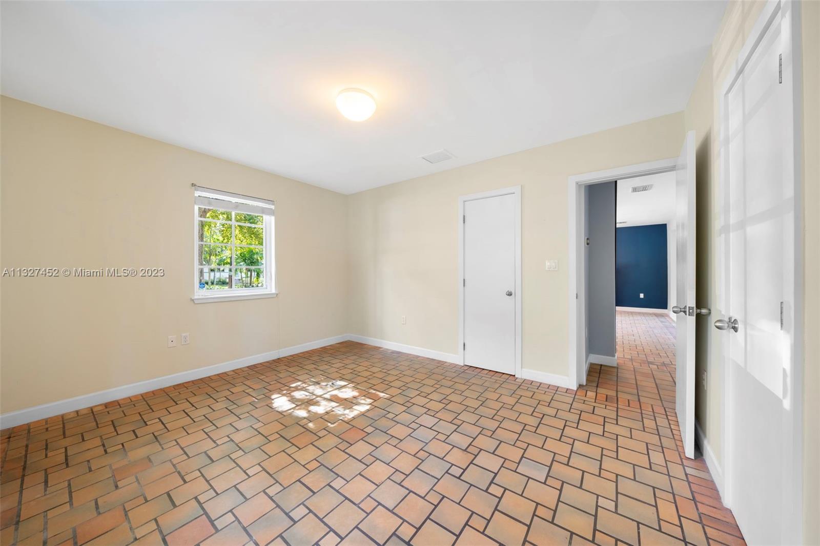 Bayside Miami, FL 33138 - Photo 4 of 9 a view of an empty room and window