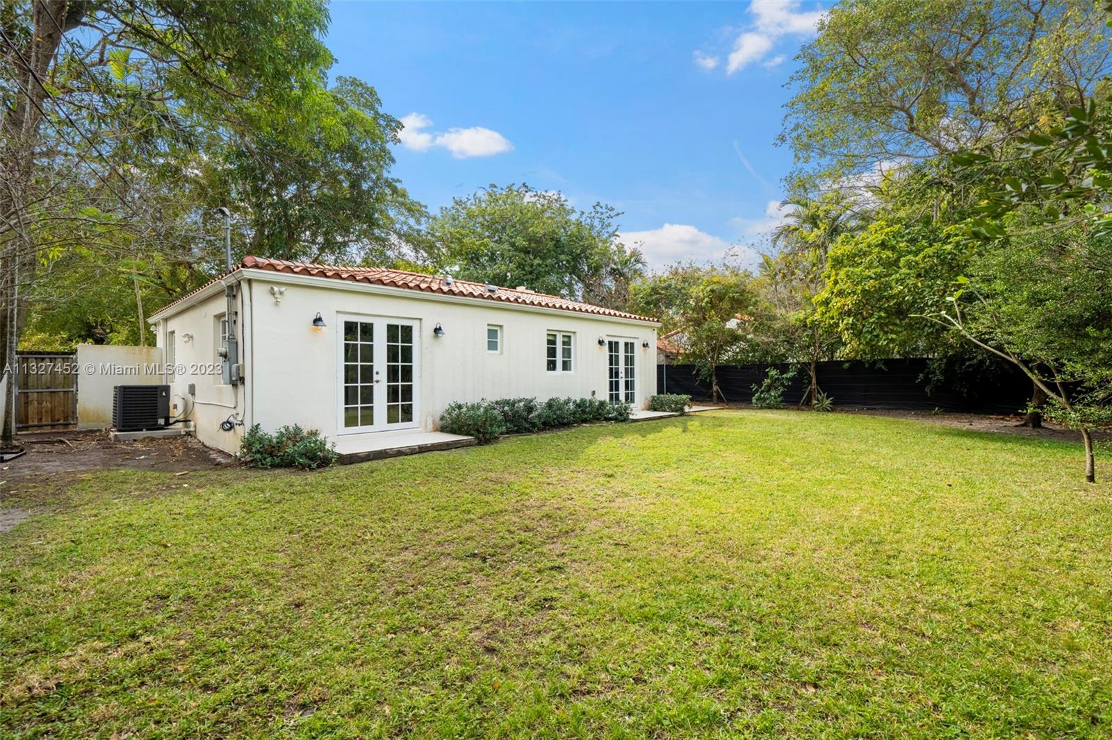 Bayside Miami, FL 33138 - Photo 9 of 9 a view of a house with a yard