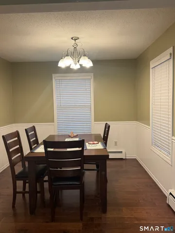 a view of a workspace with furniture