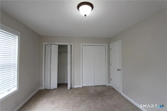 an empty room with window