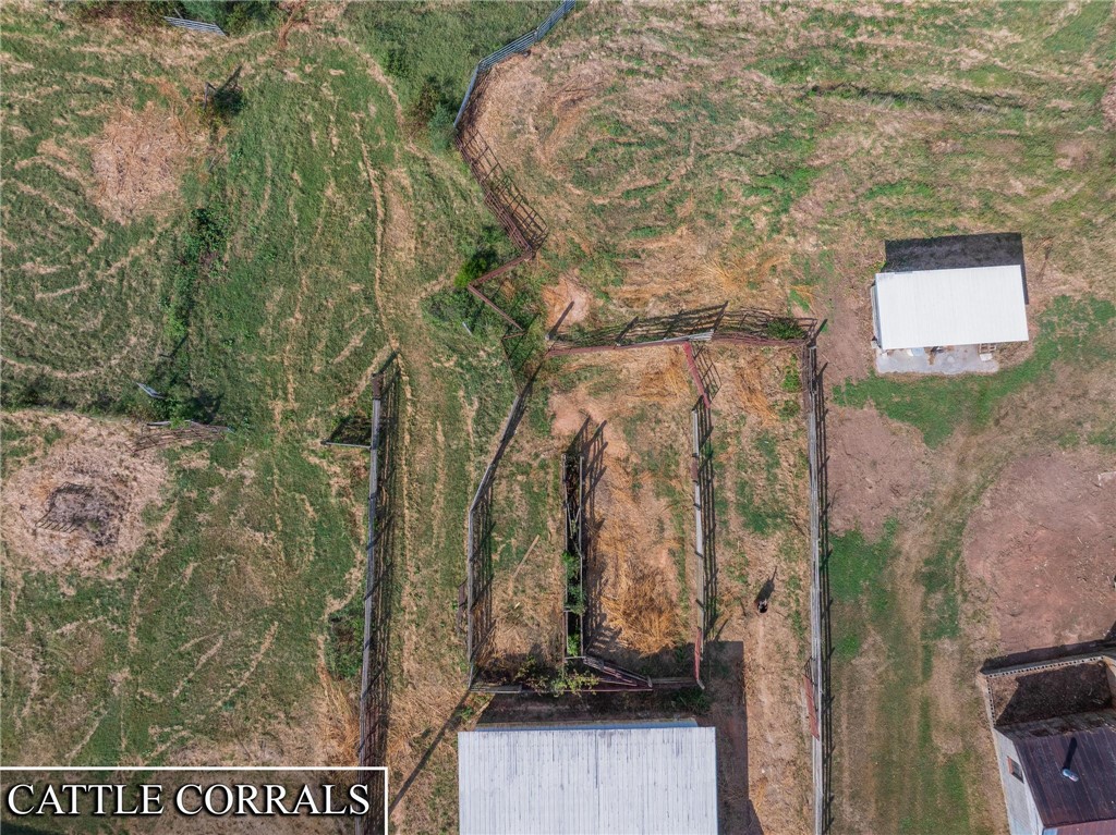 910 Highway 182 Fair Play, SC 29643 - Photo 37 of 50 Functional cattle corrals and agricultural structures span this expansive rural acreage.