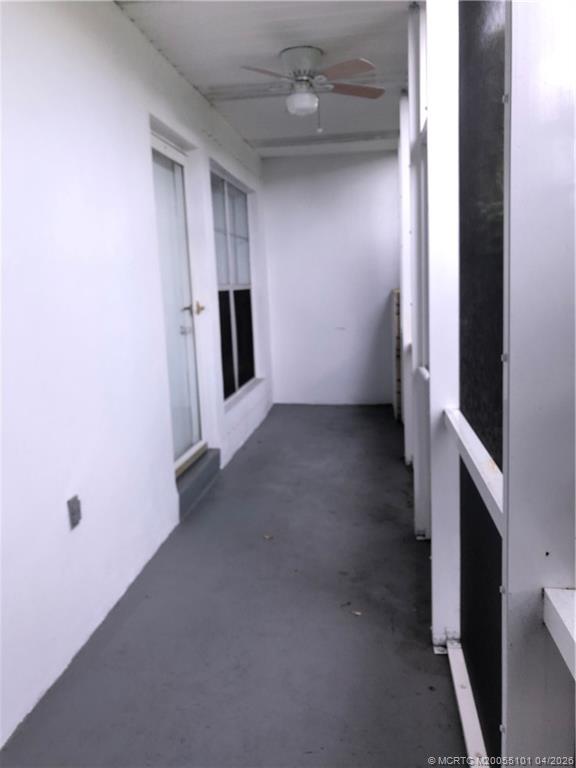 2124 Southeast Edler Drive Stuart, FL 34994 - Photo 15 of 16 an empty room with a door