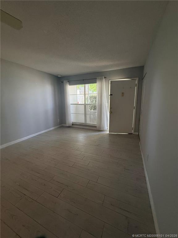 2124 Southeast Edler Drive Stuart, FL 34994 - Photo 7 of 16 an empty room with windows