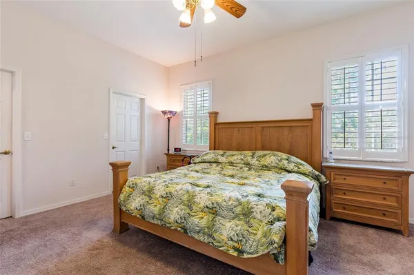 a bathroom with a bathtub a sink and a mirror
