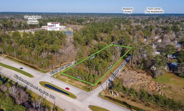 a view of a balcony with floor to ceiling windows