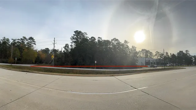 a view of swimming pool with an outdoor seating