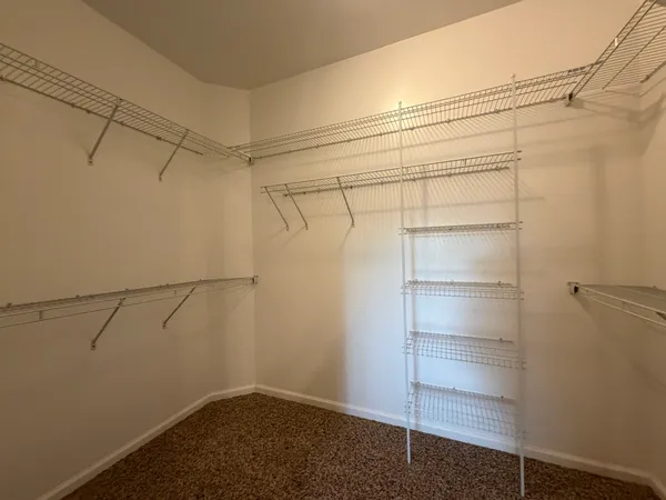 a view of a room with racks on the wall