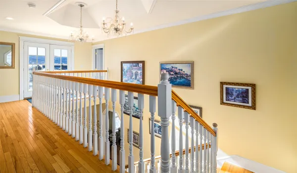 a view of a hallway with a large window