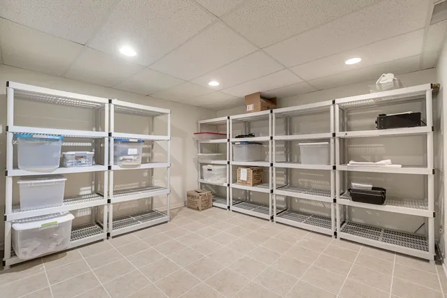 a view of an empty room with empty shelves