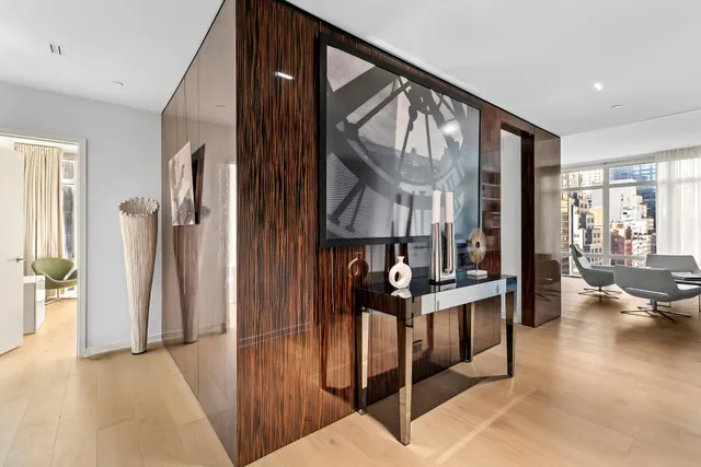 a view of living room kitchen and windows