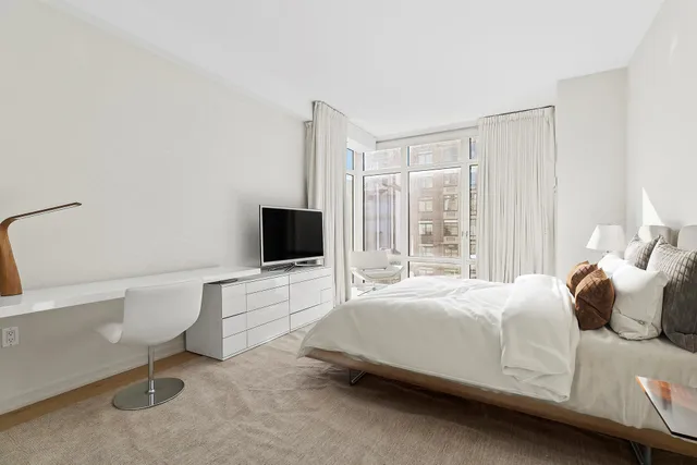 a kitchen with a sink and stainless steel appliances