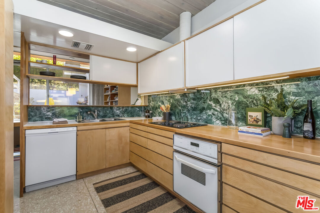 8554 Day Street Sunland, CA 91040 - Photo 12 of 34 a kitchen with a sink and cabinets
