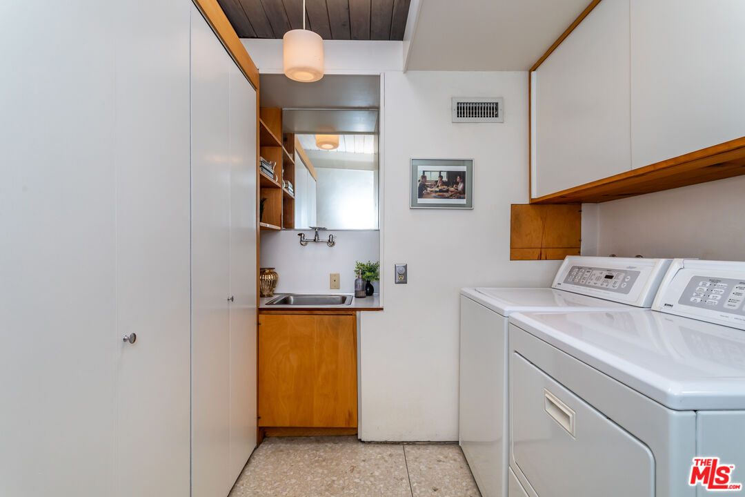 8554 Day Street Sunland, CA 91040 - Photo 23 of 34 a utility room with dryer and washer