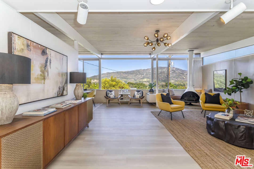 8554 Day Street Sunland, CA 91040 - Photo 7 of 34 a living room with furniture kitchen view and a large window