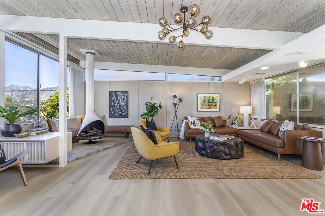 8554 Day Street Sunland, CA 91040 - Photo 8 of 34 a living room with furniture and a large window