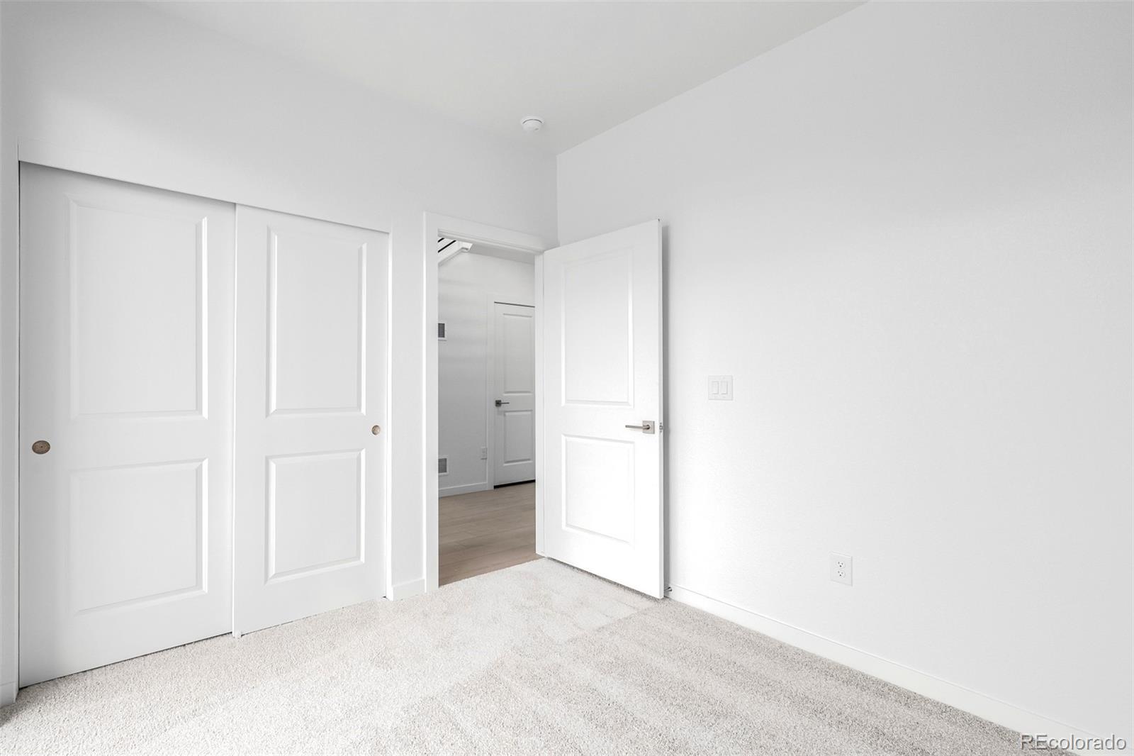 2076 South Holly Street, Unit 2 Denver, CO 80222 - Photo 15 of 24 a view of an empty room