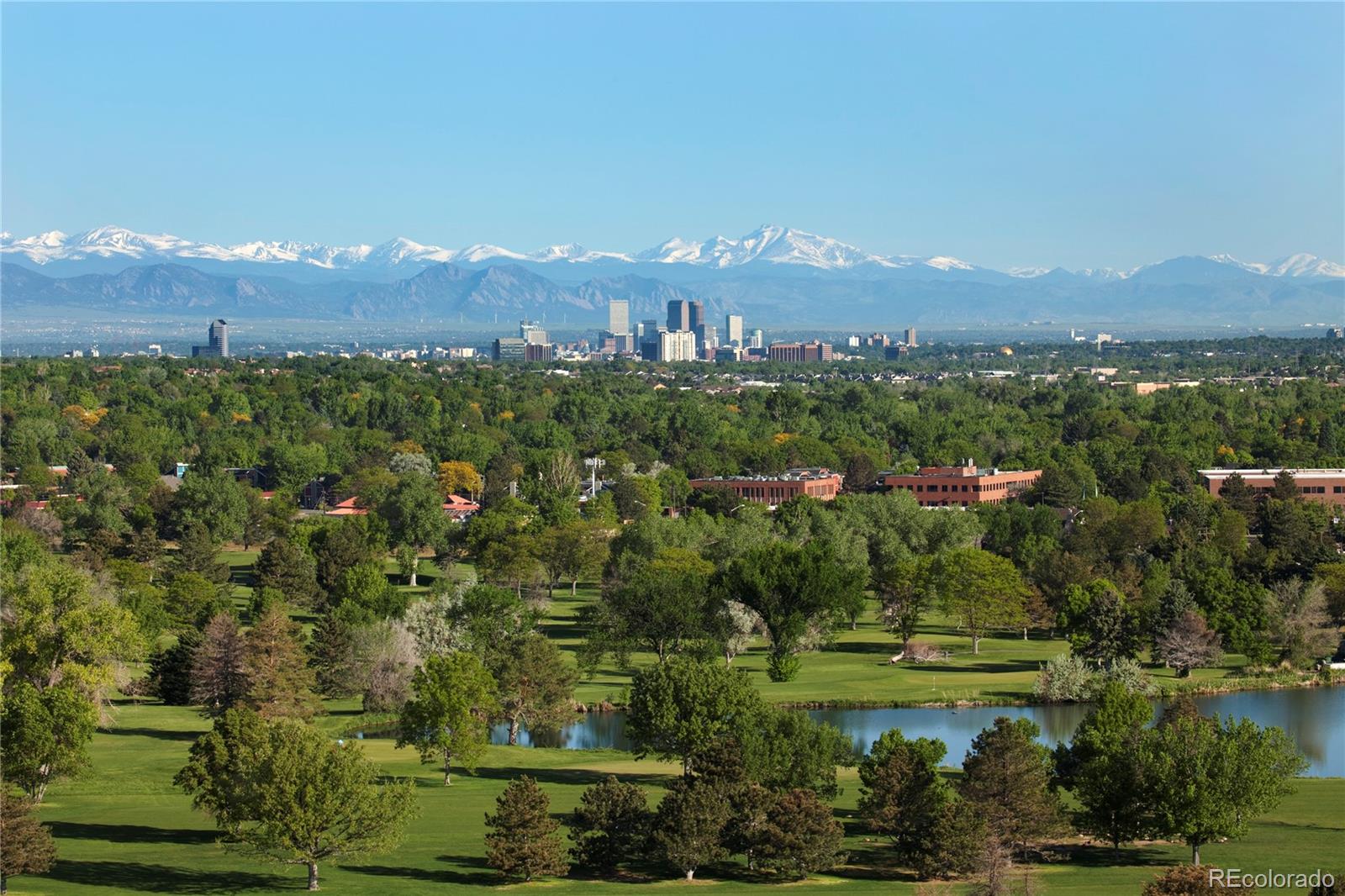 2076 South Holly Street, Unit 2 Denver, CO 80222 - Photo 23 of 24 an aerial view of residential house with outdoor space and mountain view in back