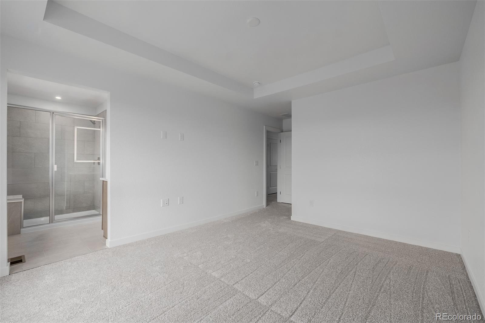 2076 South Holly Street, Unit 2 Denver, CO 80222 - Photo 9 of 24 a view of an empty room
