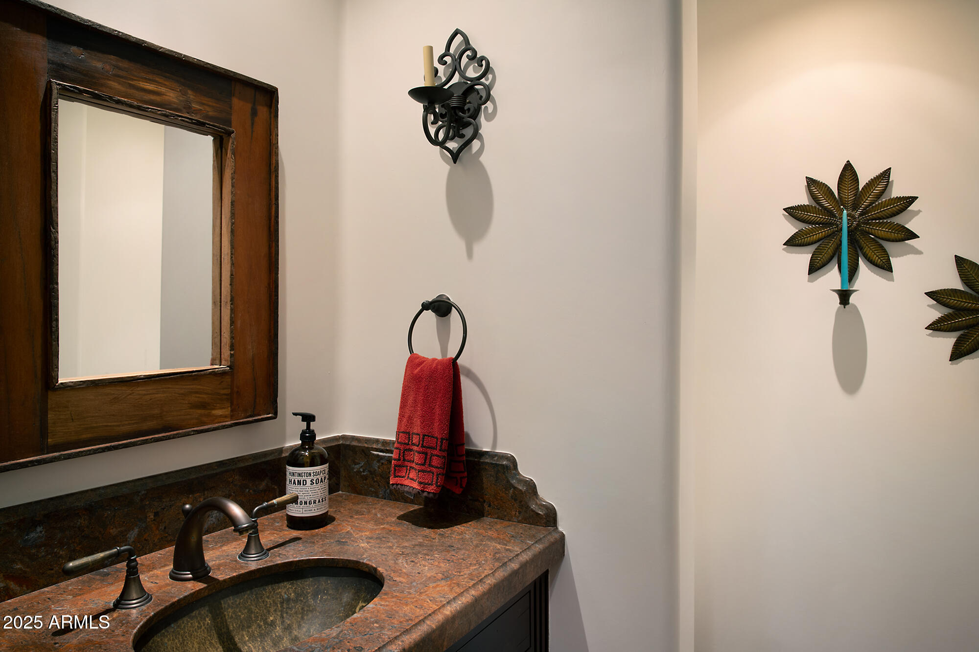 10040 East Happy Valley Road, Unit 784 Scottsdale, AZ 85255 - Photo 12 of 47 a bathroom with a granite countertop sink and a mirror