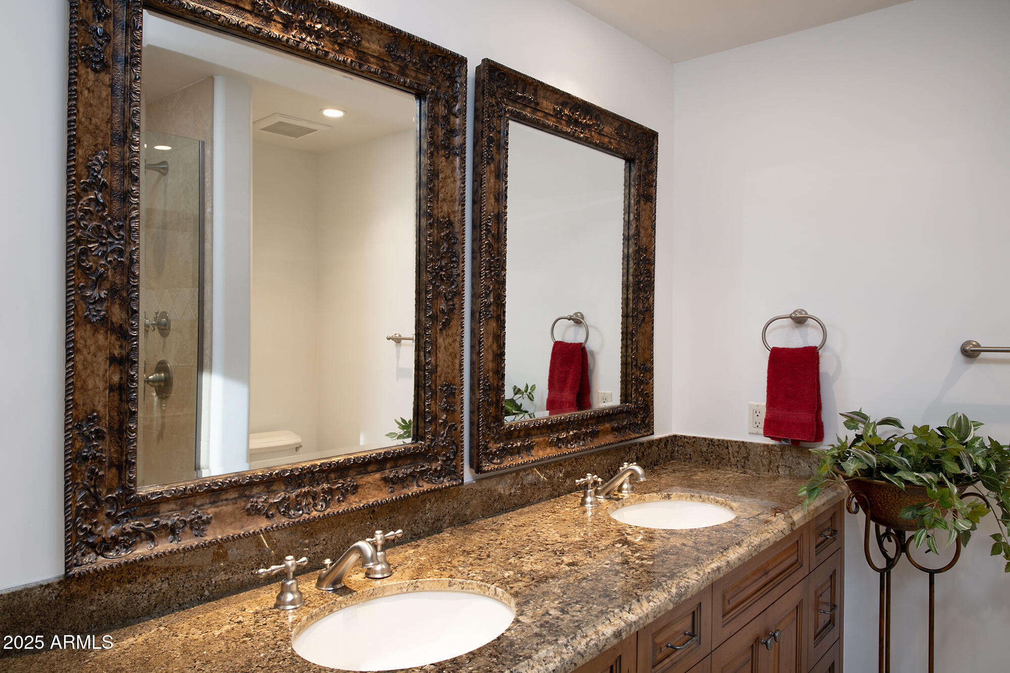 10040 East Happy Valley Road, Unit 784 Scottsdale, AZ 85255 - Photo 15 of 47 a bathroom with a granite countertop sink and a mirror