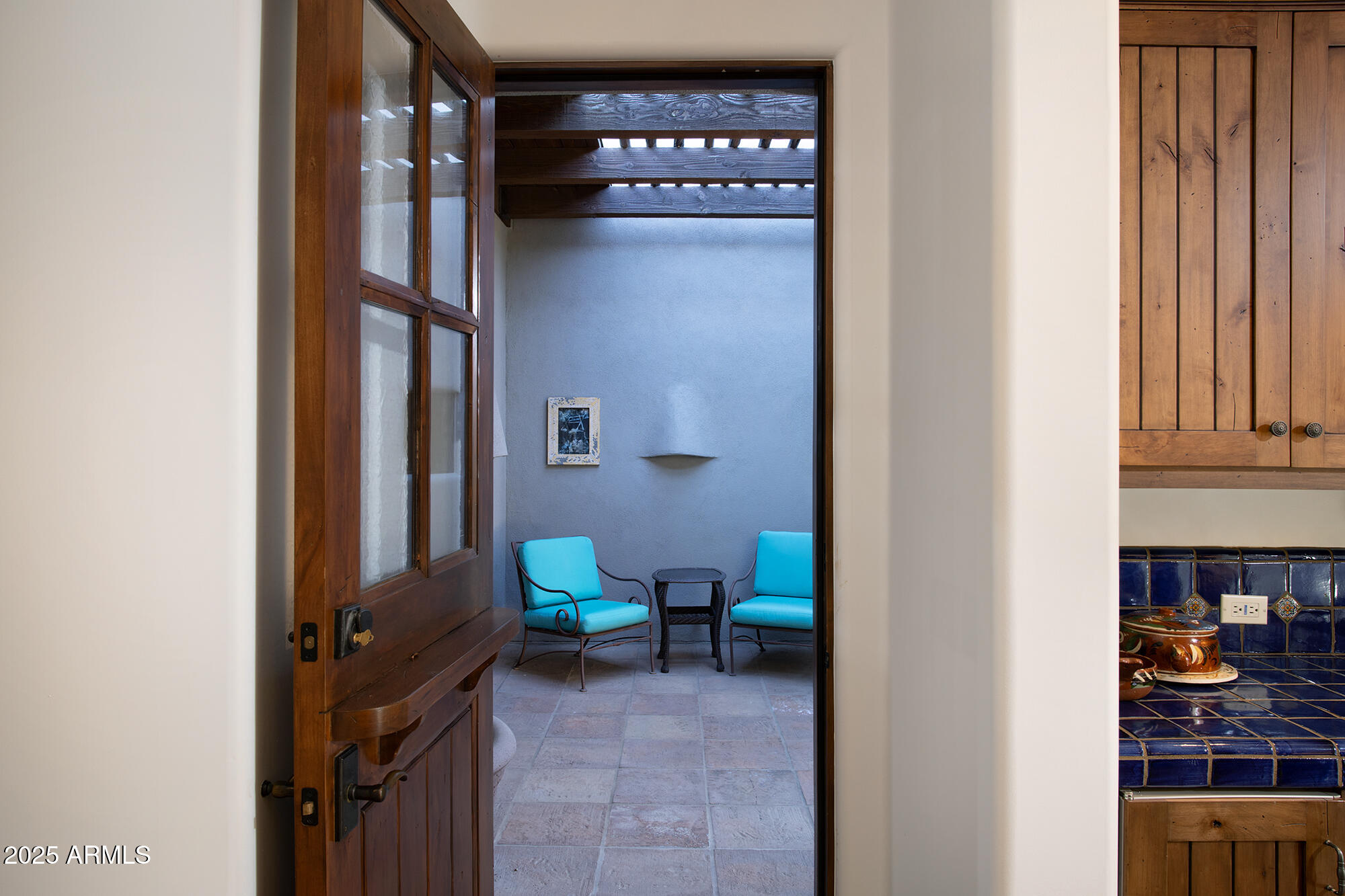 10040 East Happy Valley Road, Unit 784 Scottsdale, AZ 85255 - Photo 35 of 47 a view of a hallway with workspace and a window