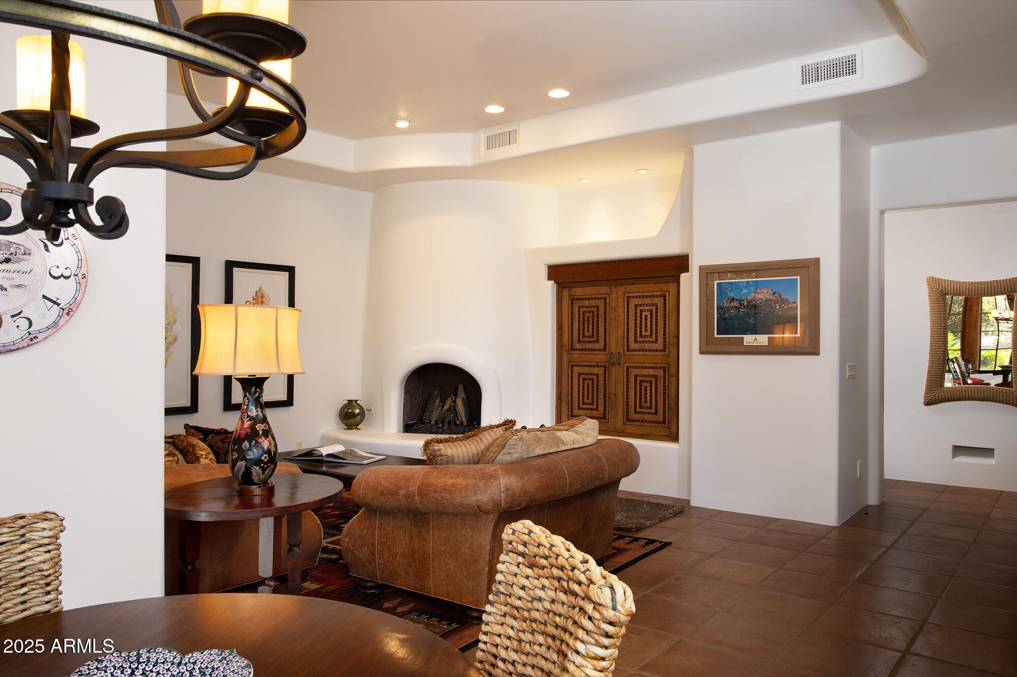 10040 East Happy Valley Road, Unit 784 Scottsdale, AZ 85255 - Photo 38 of 47 a living room with furniture a window and a flat screen tv