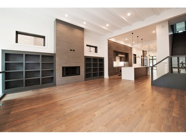 Undisclosed Address Chicago, IL 60614 - Photo 8 of 25 a view of a living room with furniture and a fireplace