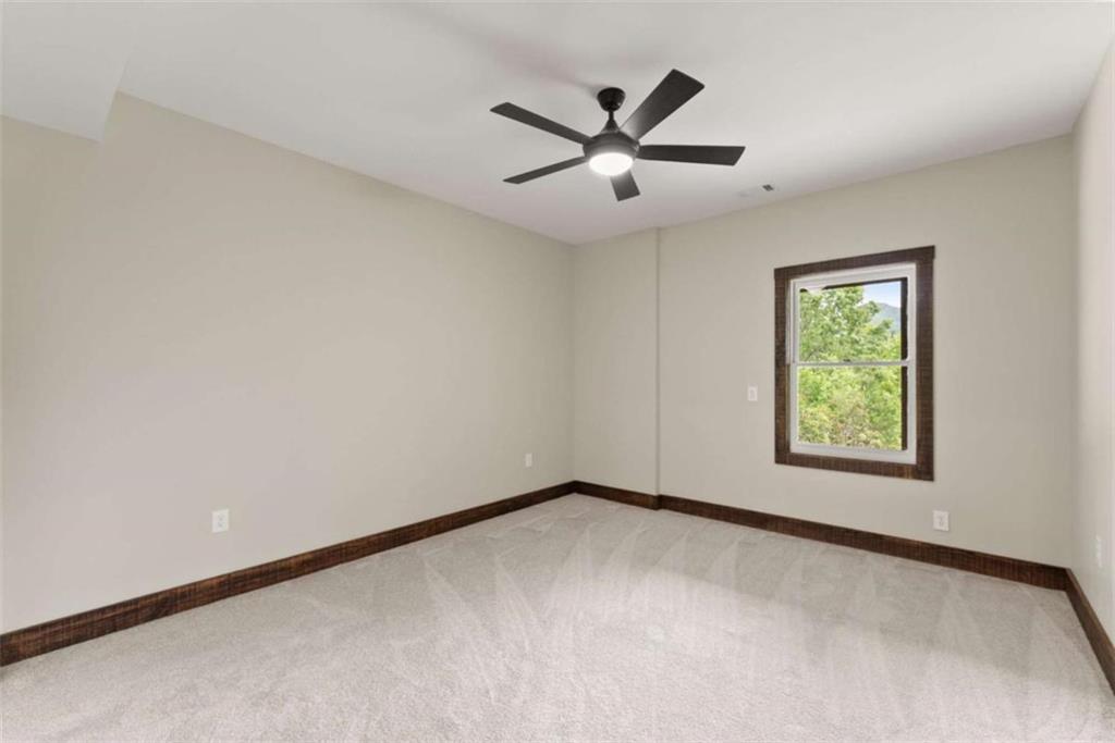 707 South Fern Cove Road Sautee Nacoochee, GA 30571 - Photo 29 of 60 a view of a big room with windows