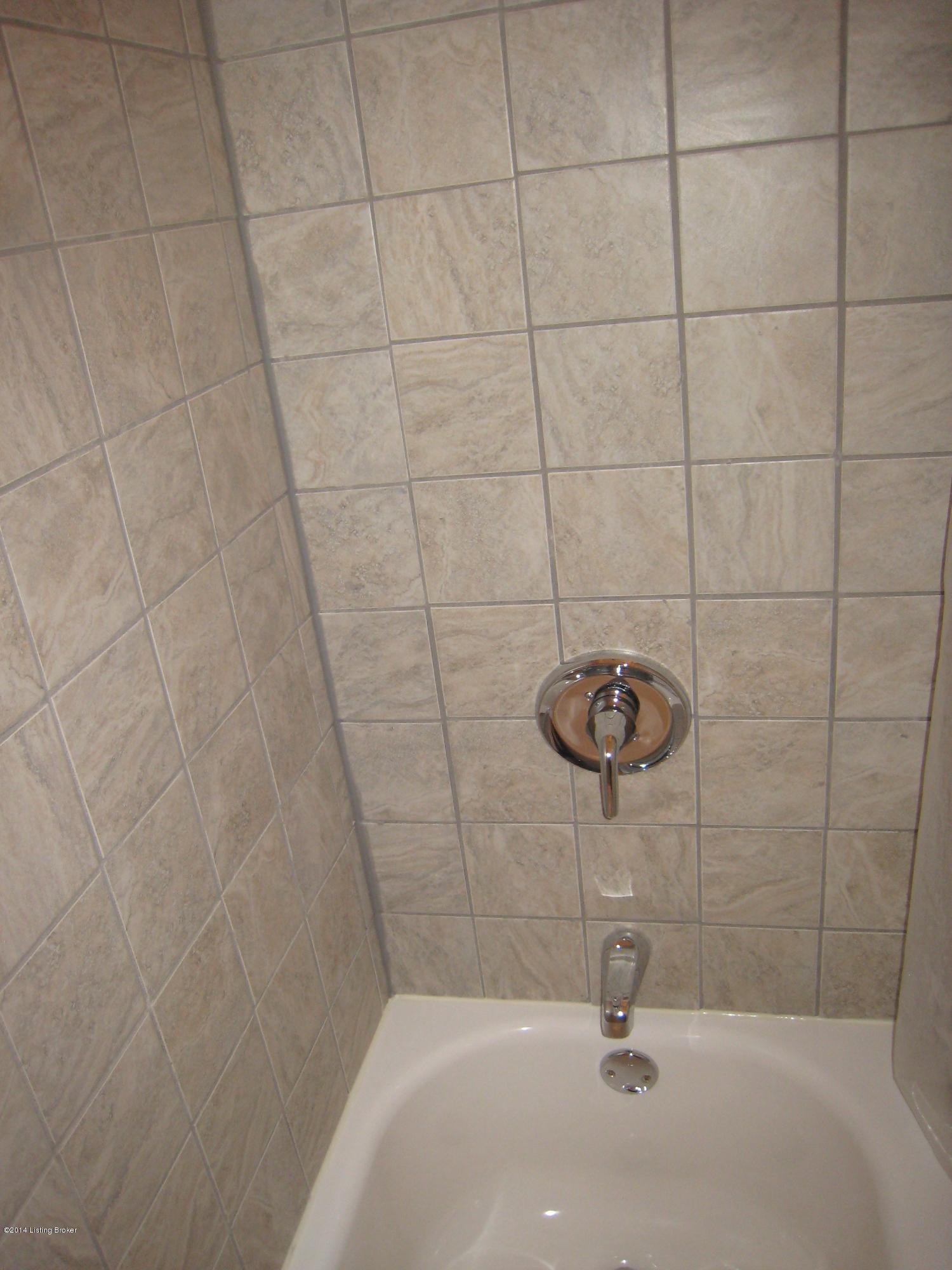 9215 New Maple Road Louisville, KY 40229 - Photo 10 of 12 New tile, new tub