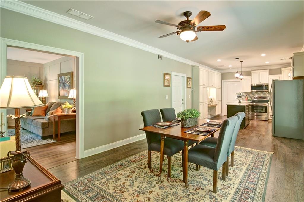 5800 Villa Rica Highway Dallas, GA 30157 - Photo 13 of 37 a dining room with furniture and a chandelier