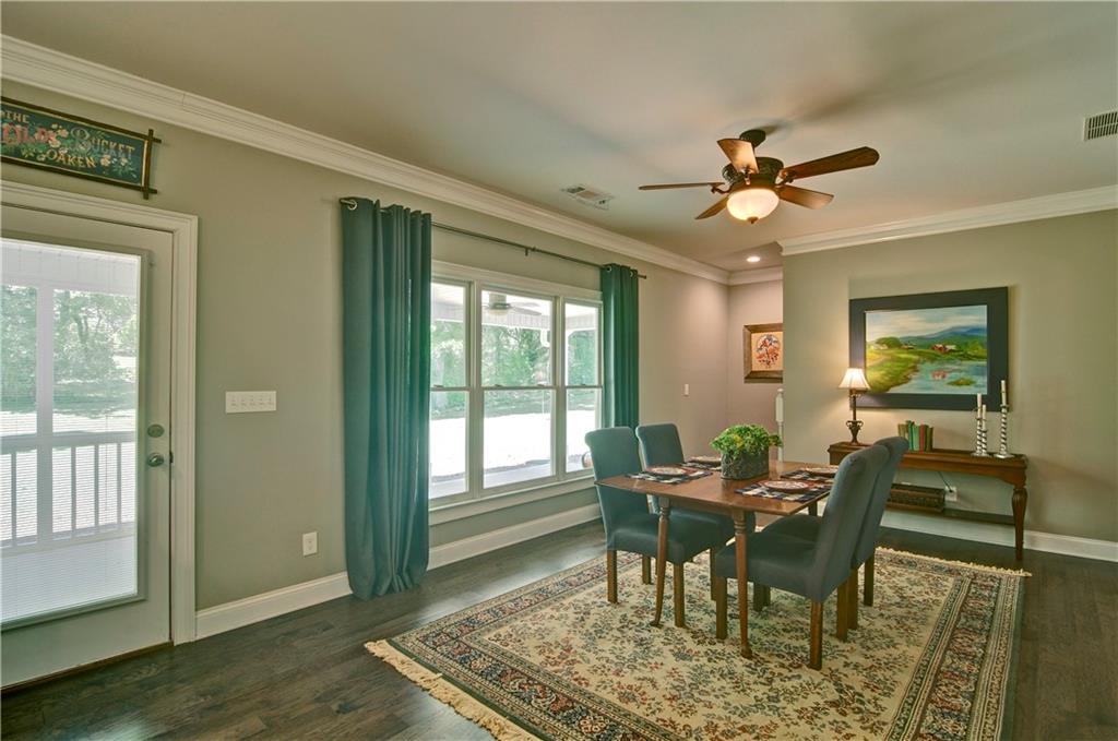 5800 Villa Rica Highway Dallas, GA 30157 - Photo 14 of 37 a view of a dining room with furniture window and wooden floor