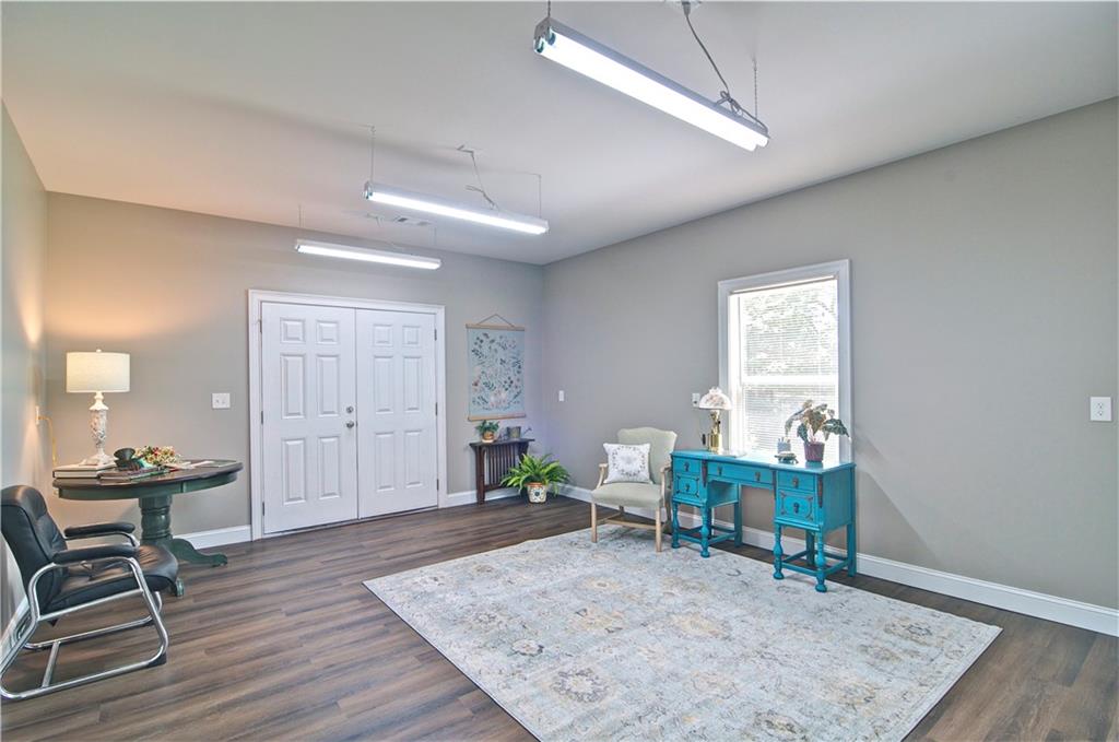 5800 Villa Rica Highway Dallas, GA 30157 - Photo 26 of 37 a living room with furniture and a wooden floor
