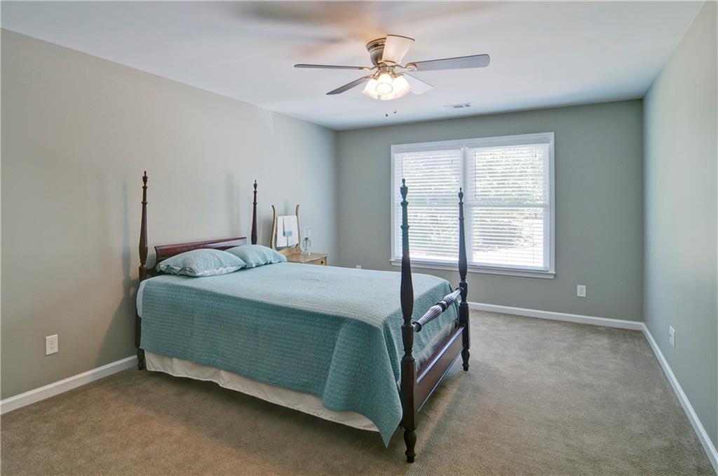 5800 Villa Rica Highway Dallas, GA 30157 - Photo 27 of 37 a bedroom with a bed and a window