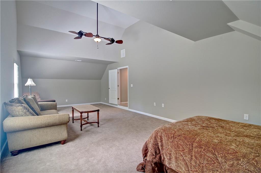 5800 Villa Rica Highway Dallas, GA 30157 - Photo 35 of 37 a bedroom with a bed and furniture