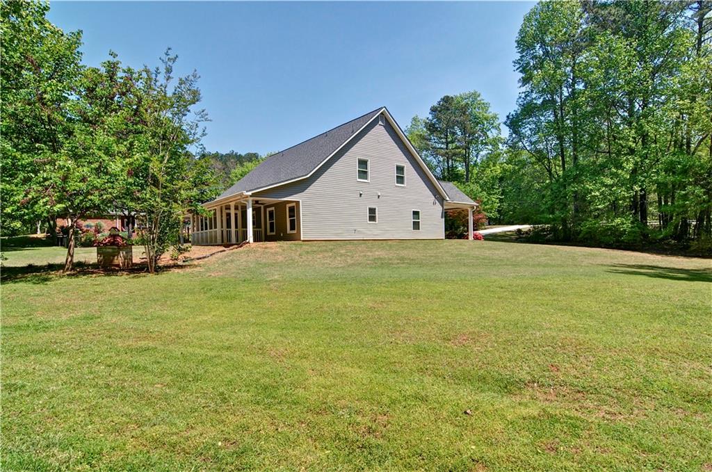 5800 Villa Rica Highway Dallas, GA 30157 - Photo 36 of 37 a view of a house with a yard