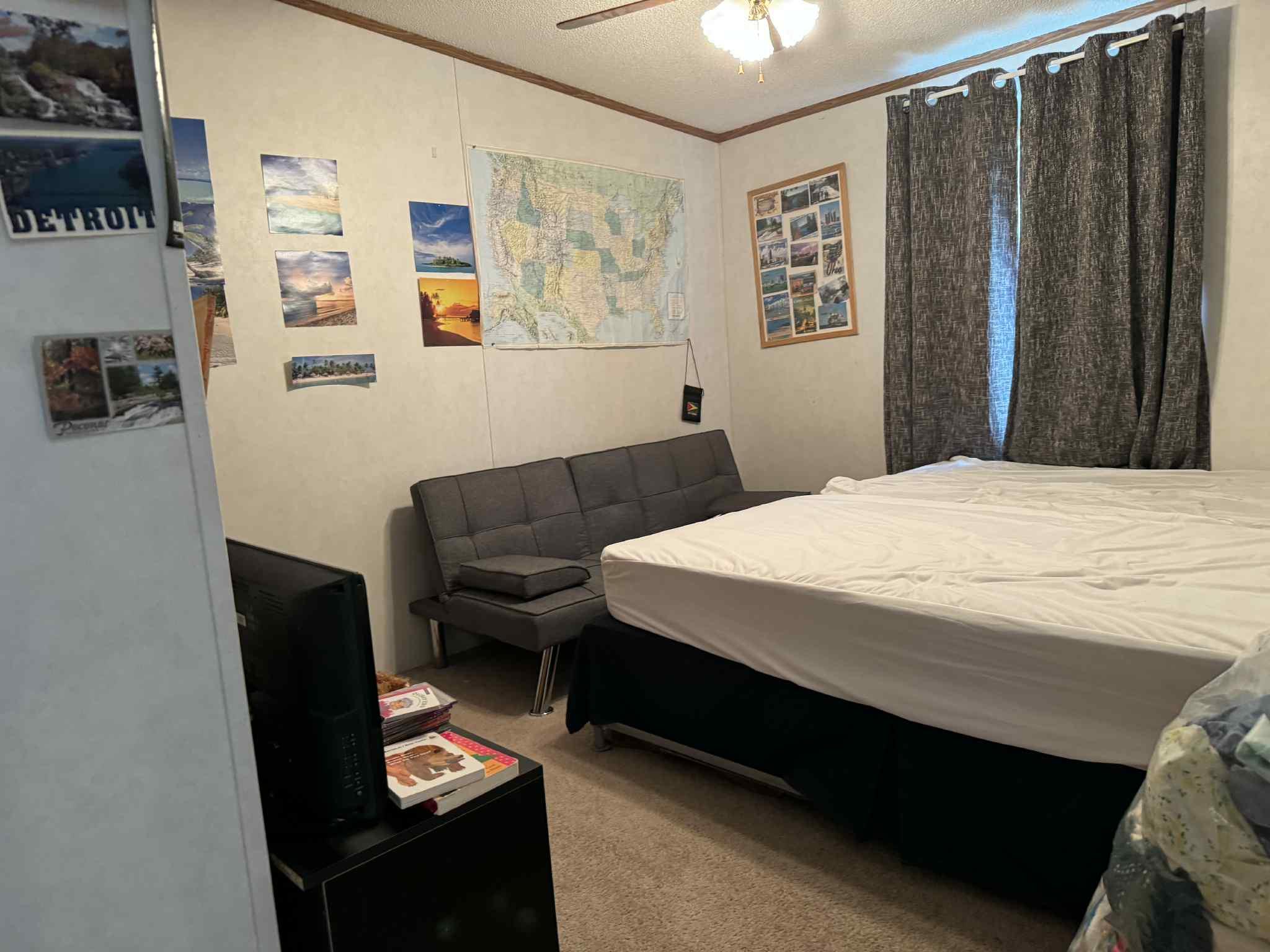 108 Todd Road Woodbourne, NY 12788 - Photo 10 of 13 Bedroom with crown molding, carpet floors, a textured ceiling, and a ceiling fan