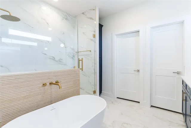 a bathroom with a sink vanity and mirror