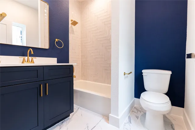 a view of a hallway with wooden floor and entryway