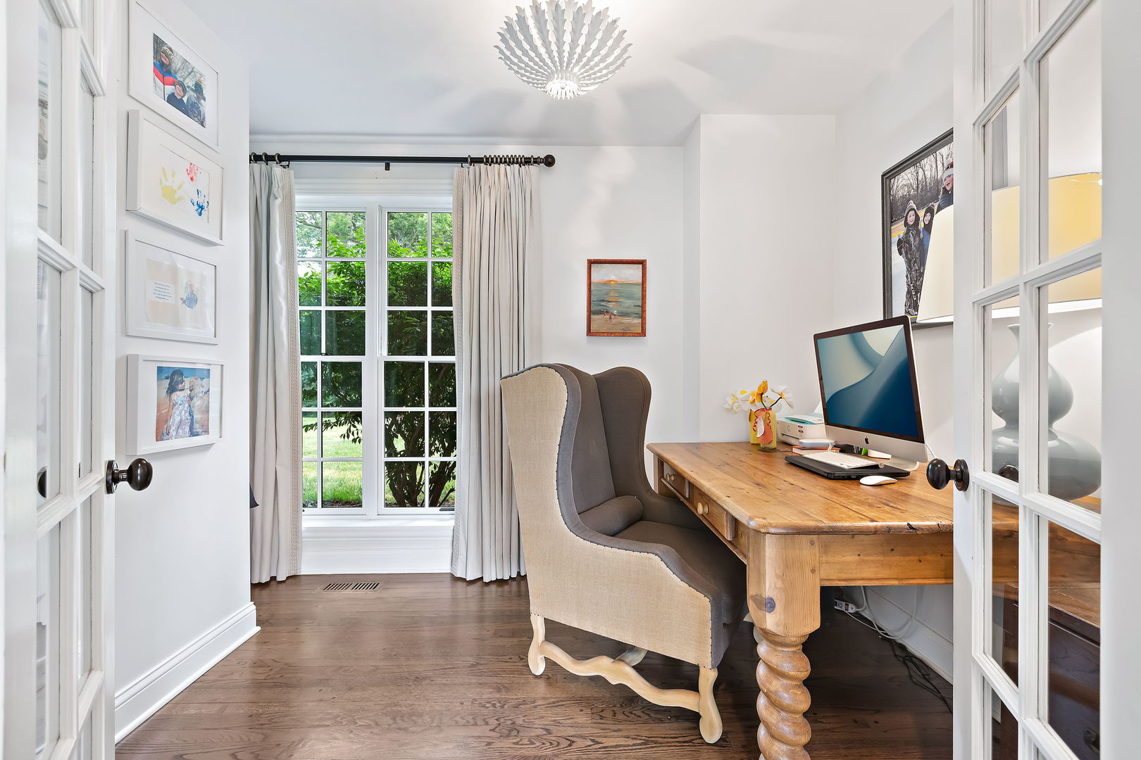 180 Old Farm Road Northfield, IL 60093 - Photo 16 of 41 a view of a workspace with furniture and a window