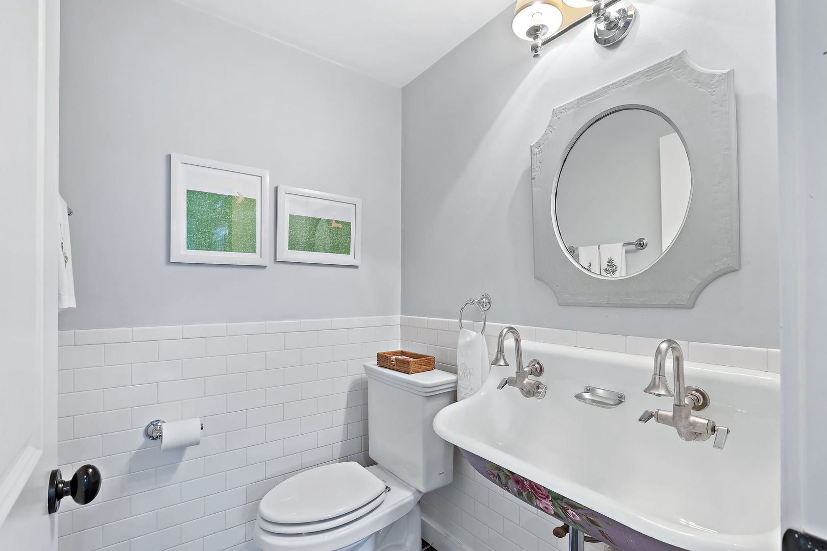 180 Old Farm Road Northfield, IL 60093 - Photo 18 of 41 a bathroom with a sink mirror and toilet