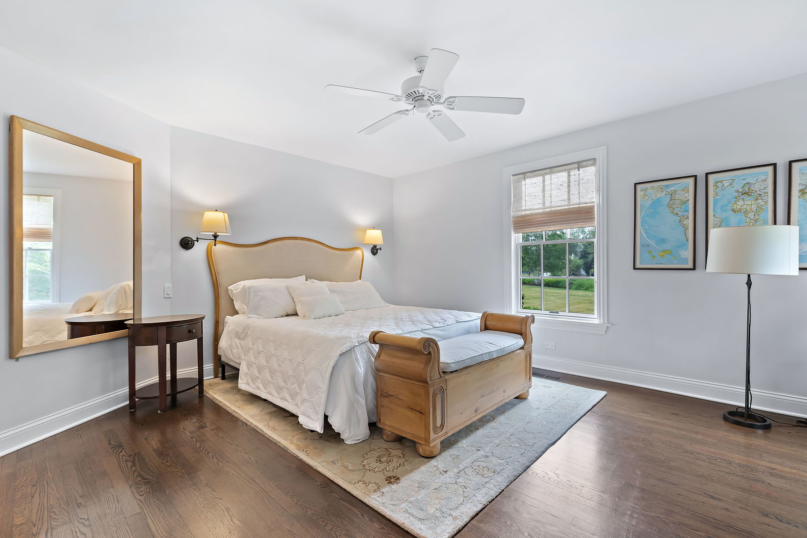 180 Old Farm Road Northfield, IL 60093 - Photo 25 of 41 a bedroom with a bed lamp and a large window with wooden floor