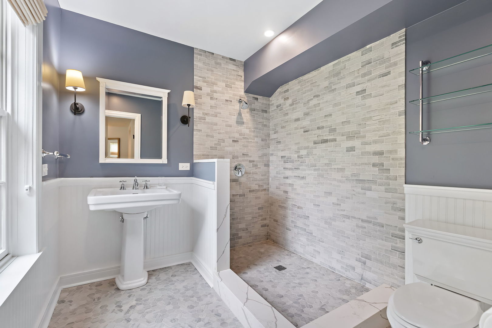 180 Old Farm Road Northfield, IL 60093 - Photo 26 of 41 a bathroom with a sink a toilet and shower