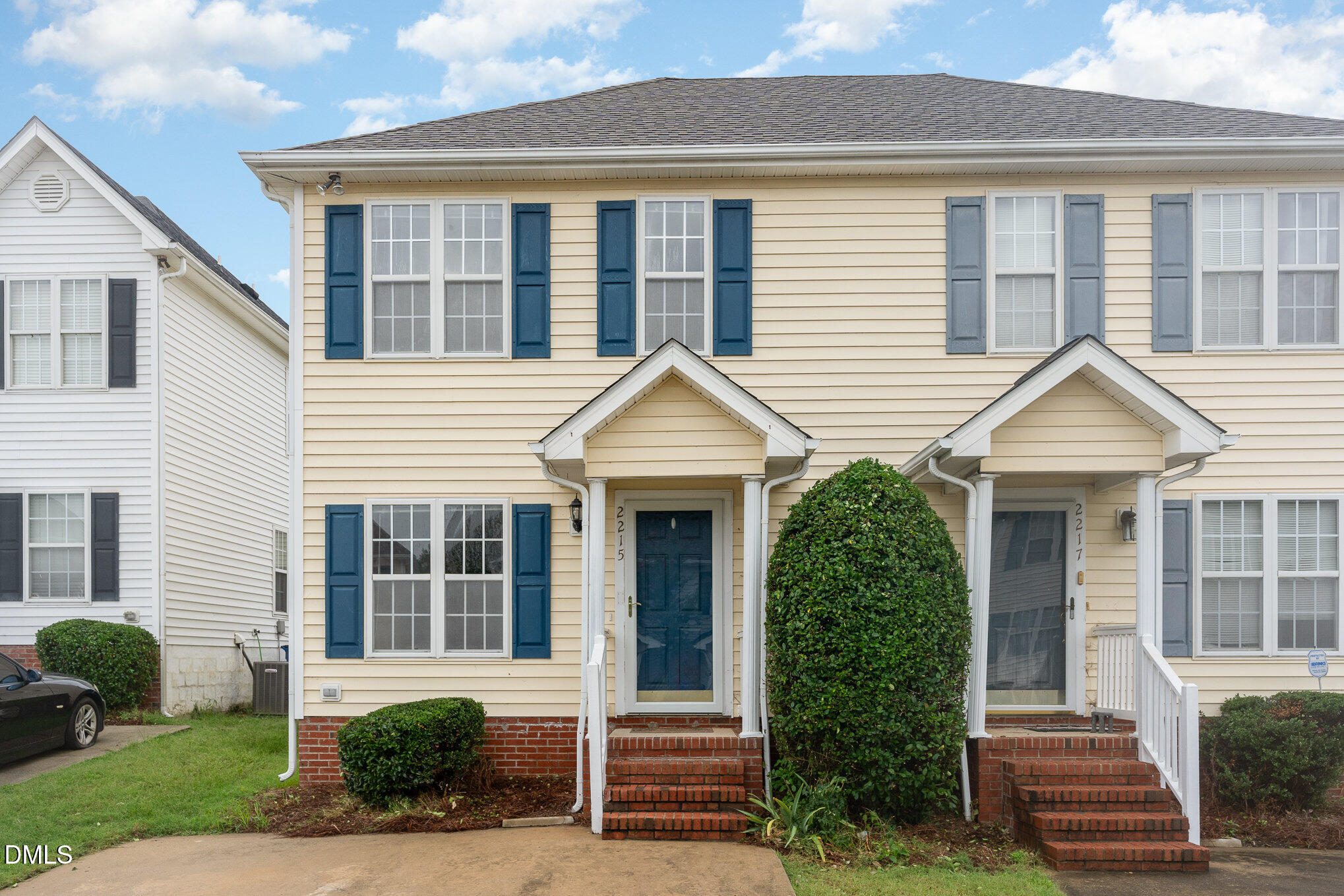 2215 Turtle Point Drive Raleigh, NC 27604 - Photo 1 of 25 a front view of a house with garden