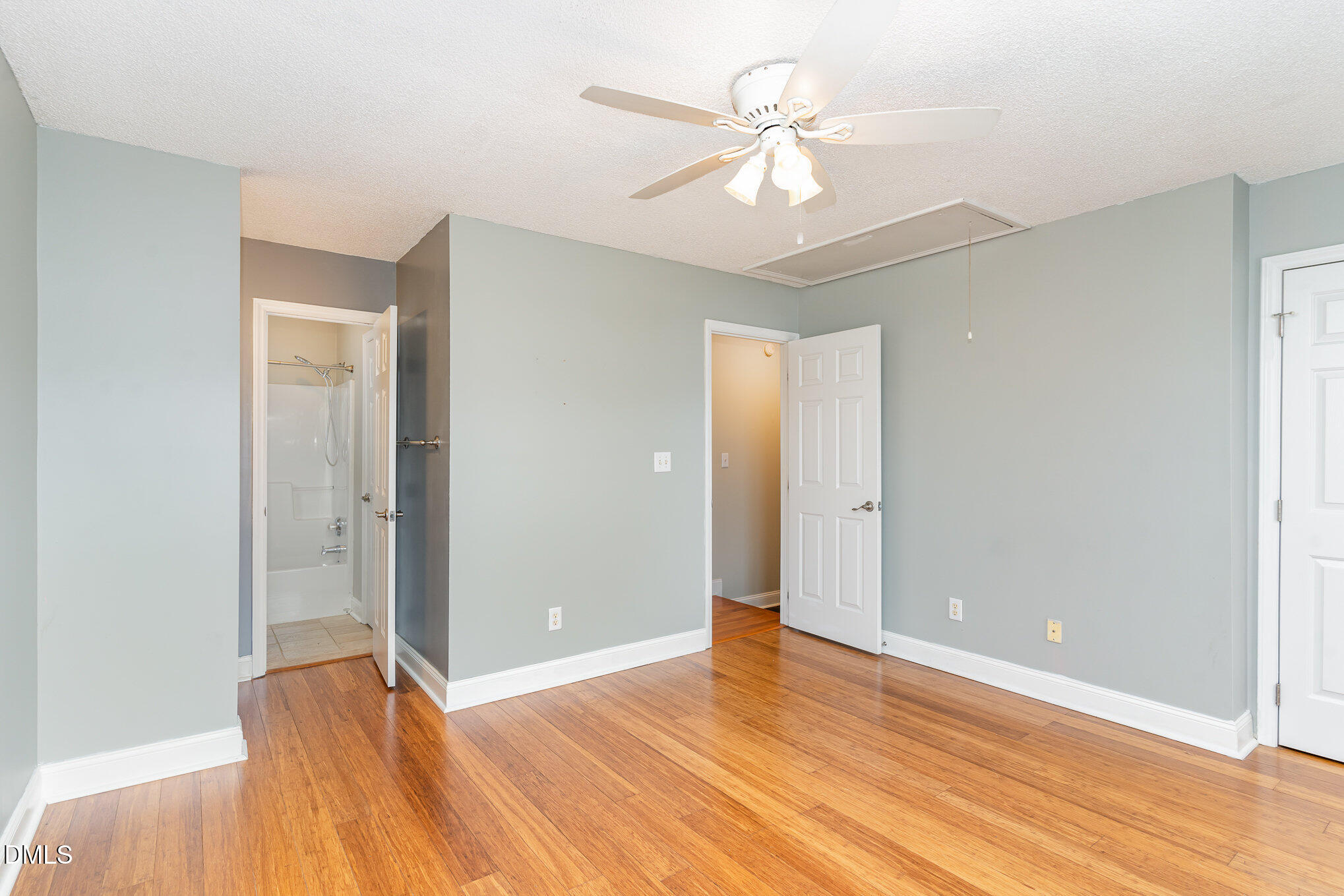 2215 Turtle Point Drive Raleigh, NC 27604 - Photo 11 of 25 a view of an empty room with wooden floor