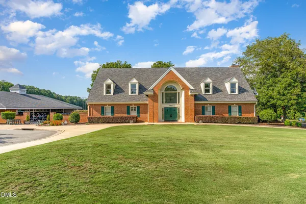 a view of front a house with a patio