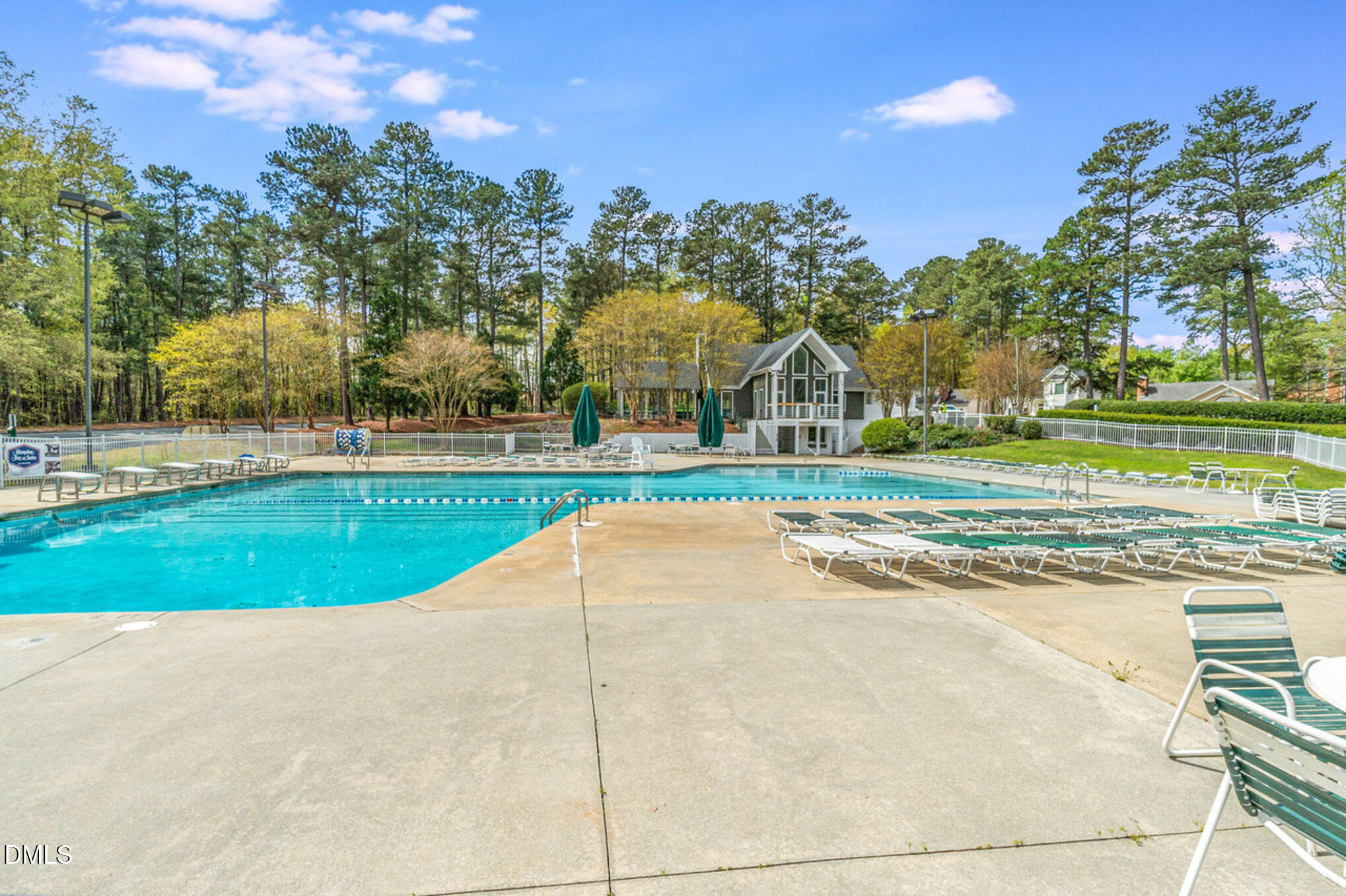 2215 Turtle Point Drive Raleigh, NC 27604 - Photo 21 of 25 a view of a swimming pool and a yard