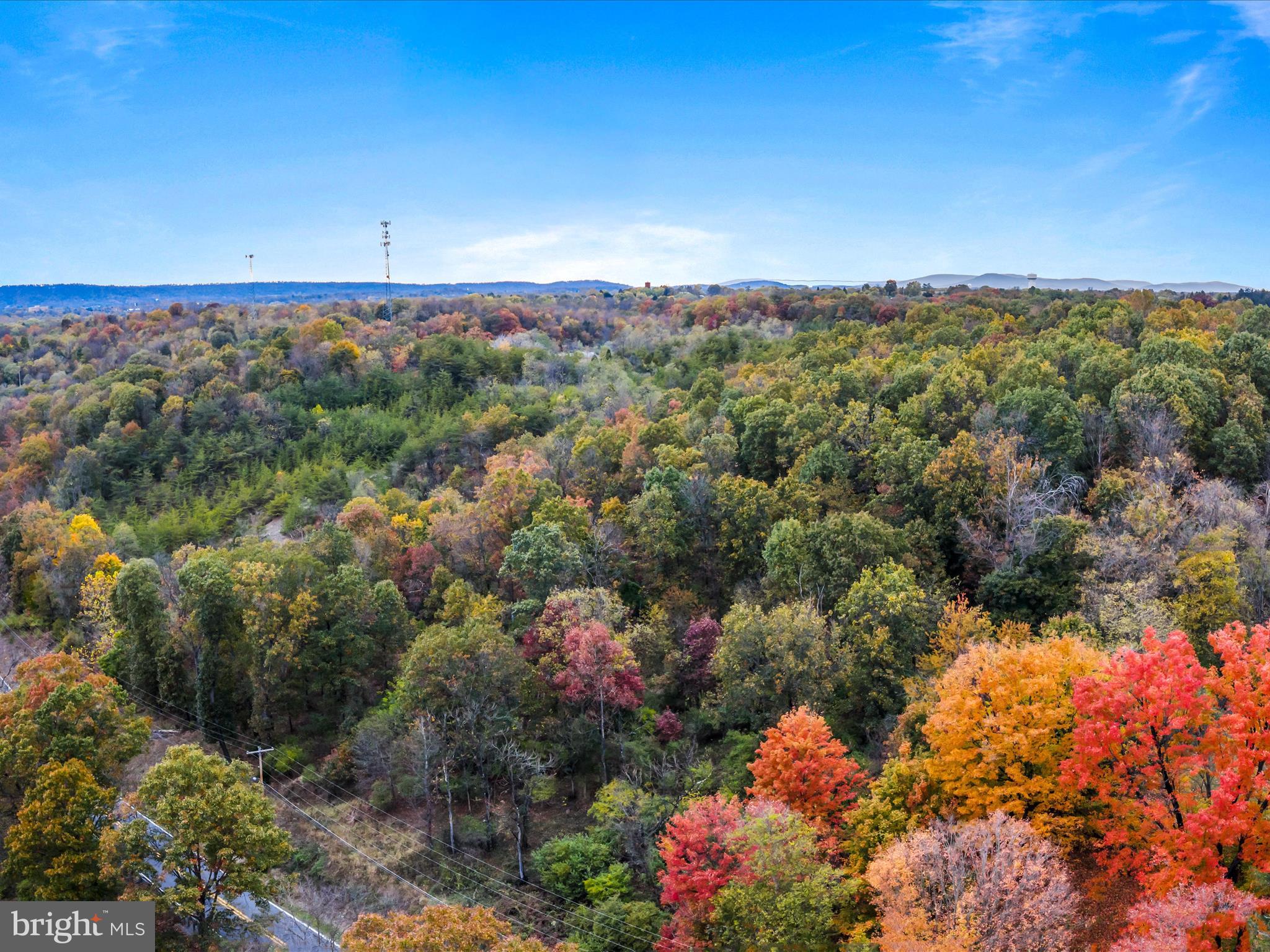 Golf Course Road Martinsburg, WV 25404 - Photo 13 of 26 a view of a city with lush green forest